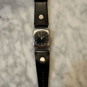 Marc Jacob’s patent leather strap watch